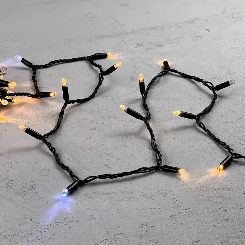 Гирлянда Нить с Колпачком 10м Экстра Тепло-Белая с Мерцанием Белого Диода 24В, 100 LED, Провод Черный ПВХ, IP65. Фото 3.