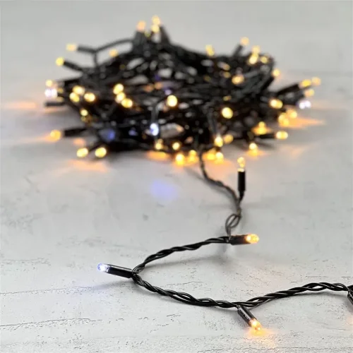 Гирлянда Нить с Колпачком 10м Экстра Тепло-Белая с Мерцанием Белого Диода 24В, 100 LED, Провод Черный ПВХ, IP65. Фото 6.