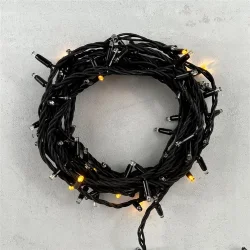 Гирлянда Нить 10м Желтая с Мерцанием Каждого Диода 220В, 100 LED, Провод Черный Каучук, IP65