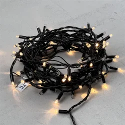 Гирлянда Нить с Колпачком 10м Тепло-Белая с Мерцанием Каждого Диода 24В, 100 LED, Провод Черный ПВХ, IP65