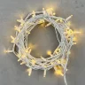 Гирлянда Нить 10м Тепло-Белая 24В, 75 LED, Провод Белый Каучук, IP65. Фото 1.