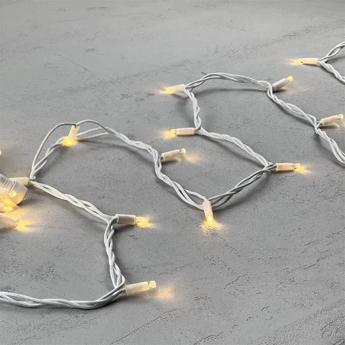 Гирлянда Нить 10м Тепло-Белая 24В, 75 LED, Провод Белый Каучук, IP65. Фото 3.