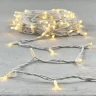 Гирлянда Нить 10м Тепло-Белая 24В, 75 LED, Провод Белый Каучук, IP65. Фото 6.