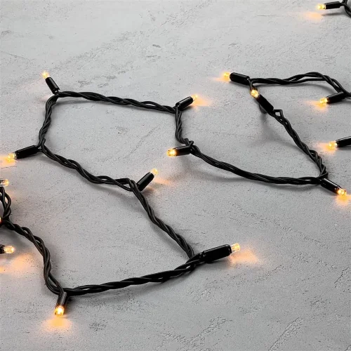 Гирлянда Нить 10м Экстра Тепло-Белая 24В, 75 LED, Провод Черный Каучук, IP65. Фото 3.