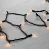 Гирлянда Нить 10м Экстра Тепло-Белая 24В, 75 LED, Провод Черный Каучук, IP65. Фото 3.