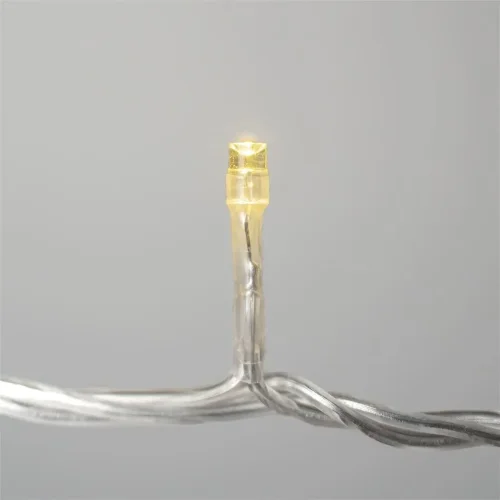 Гирлянда Нить 10м Тепло-Белая с Мерцанием Белого Диода 220В, 100 LED, Провод Прозрачный ПВХ, IP54. Фото 2.